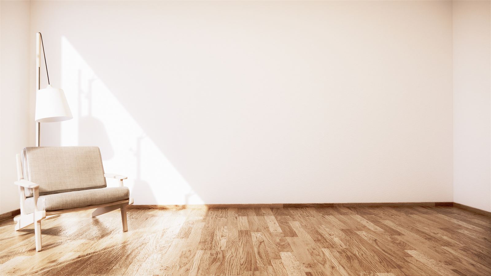 Minimalist Nairobi interior design with beige armchair and warm earthy palette by Art Le Chic